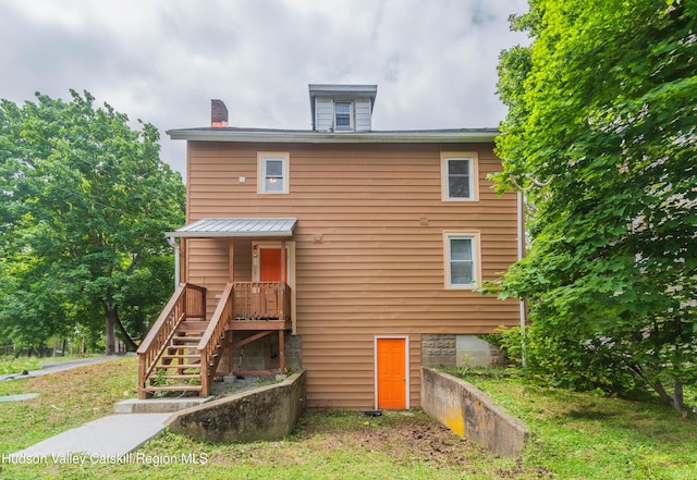 24 Grove St, Cairo, NY 12413 - back of house featuring a chimney