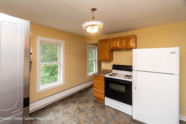 24 Grove St, Cairo, NY 12413 - kitchen featuring white appliances, baseboard heating, brown cabinetry, hanging light fixtures, and dark countertops