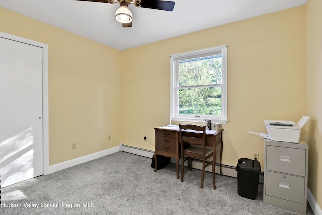 home office with light carpet and ceiling fan