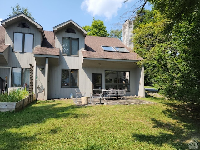 4 French Park Dr Unit 2A, Windham, NY 12496 - back of property with a chimney, a shingled roof, a yard, and a patio