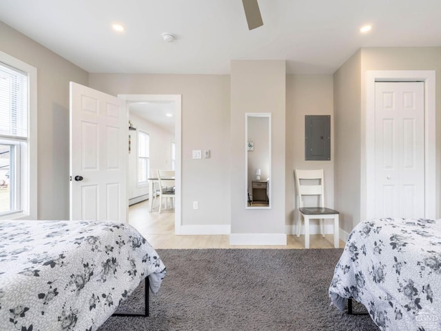 7614 Main St, Hunter, NY 12444 - bedroom with electric panel, recessed lighting, baseboards, ceiling fan, and a closet