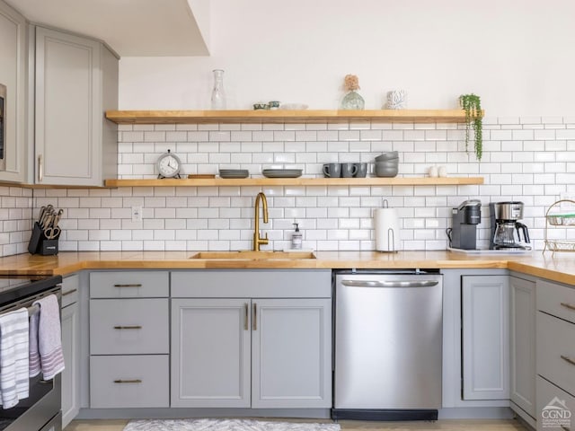 7614 Main St, Hunter, NY 12444 - kitchen featuring stainless steel appliances, gray cabinetry, and open shelves