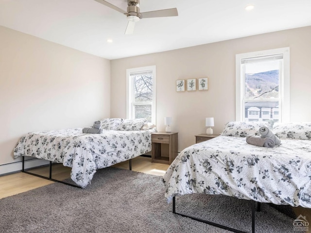 7614 Main St, Hunter, NY 12444 - bedroom featuring wood finished floors, recessed lighting, and ceiling fan