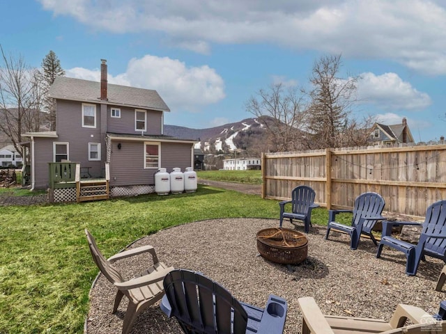 7614 Main St, Hunter, NY 12444 - view of patio featuring an outdoor fire pit and a deck with mountain view
