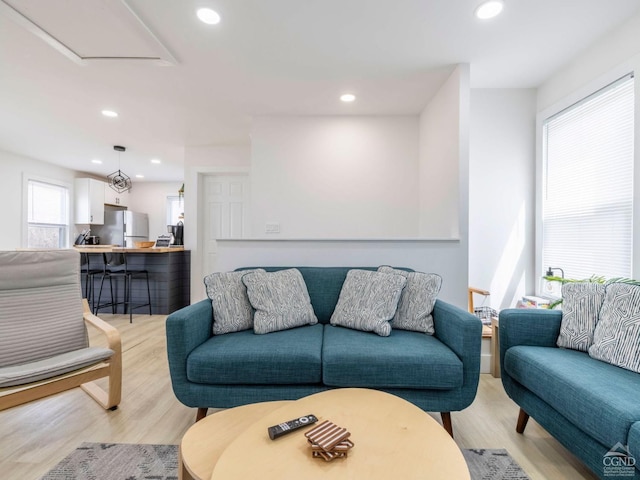 7614 Main St, Hunter, NY 12444 - living area featuring light wood finished floors and recessed lighting