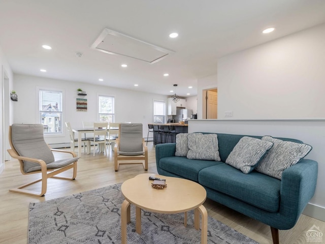 7614 Main St, Hunter, NY 12444 - living area with attic access, recessed lighting, and light wood-style flooring