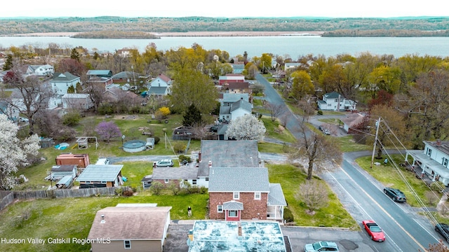 drone / aerial view with a water view