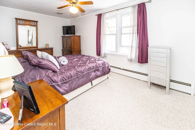 carpeted bedroom featuring a ceiling fan, a baseboard heating unit, and ornamental molding