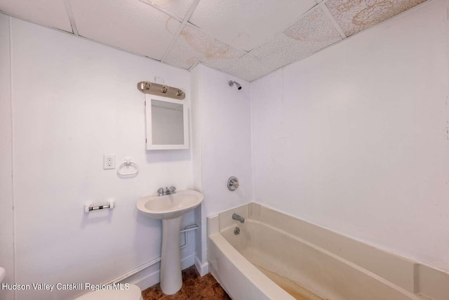 9 Hasbrouck Pl, Kingston, NY 12401 - bathroom featuring a drop ceiling, shower / tub combination, and toilet