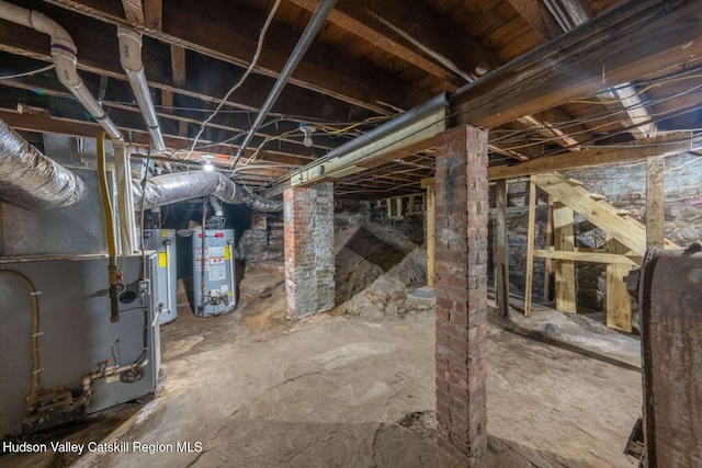 9 Hasbrouck Pl, Kingston, NY 12401 - unfinished below grade area featuring heating unit and water heater