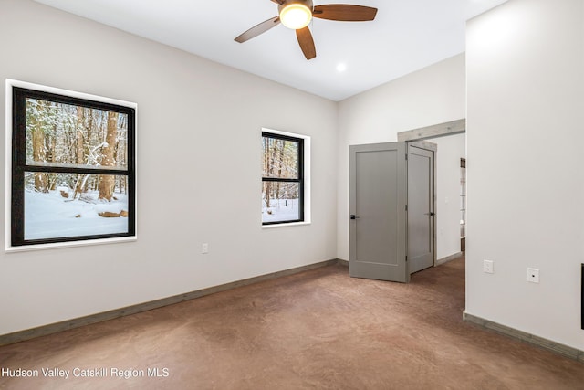 unfurnished bedroom featuring ceiling fan