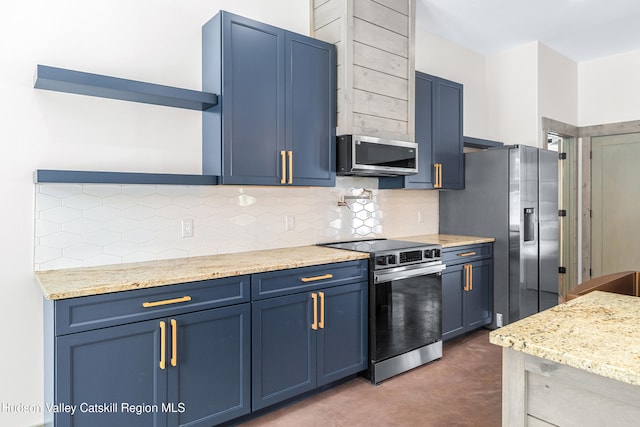 kitchen with decorative backsplash, light stone counters, appliances with stainless steel finishes, and blue cabinets