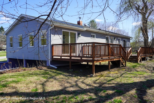 16 Trinity Pl, Rhinebeck, NY 12572 - rear view of property featuring a chimney and a deck