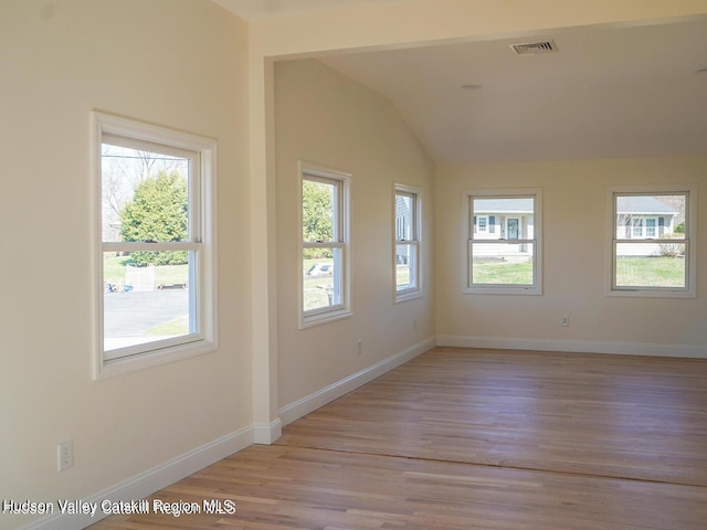 16 Trinity Pl, Rhinebeck, NY 12572 - unfurnished room with light wood-style flooring, vaulted ceiling, and baseboards