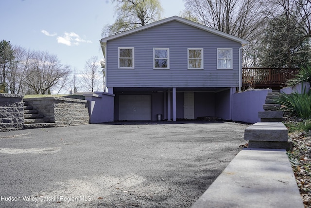 16 Trinity Pl, Rhinebeck, NY 12572 - view of front of property featuring an attached garage and driveway