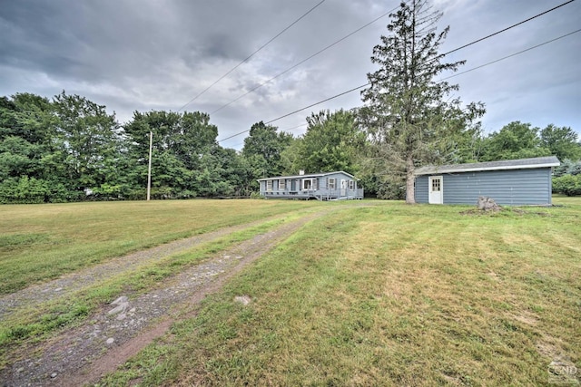 871 Mail Route Rd, Ashland, NY 12407 - view of green lawn featuring an outbuilding