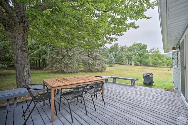 871 Mail Route Rd, Ashland, NY 12407 - wooden terrace featuring a yard, outdoor dining area, and view of wooded area