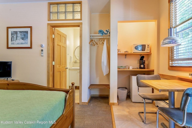 bedroom with ornamental molding