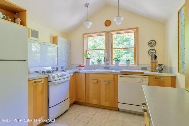 kitchen featuring sink, hanging light fixtures, tasteful backsplash, vaulted ceiling, and white appliances