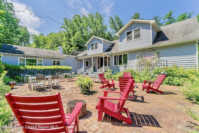 back of property with a patio area