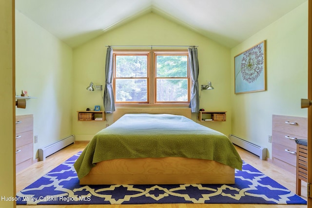 bedroom featuring lofted ceiling, light hardwood / wood-style flooring, and a baseboard radiator