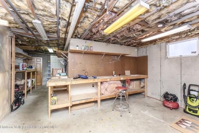 office space featuring ceiling fan and hardwood / wood-style floors