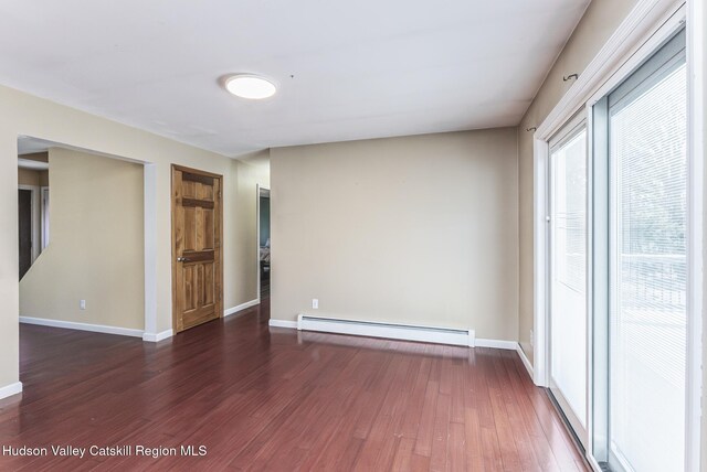 dining space with hardwood / wood-style flooring