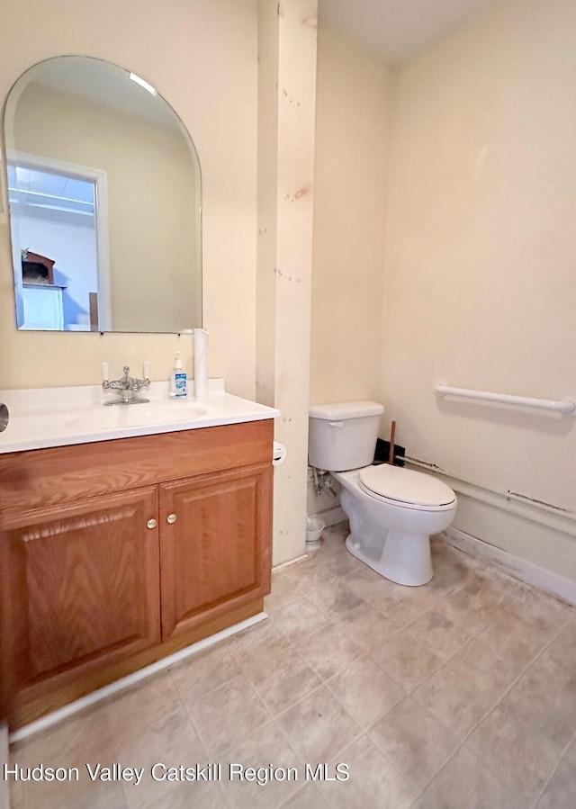 71 Watson Hollow Rd, West Shokan, NY 12494 - bathroom featuring vanity, toilet, and tile patterned floors