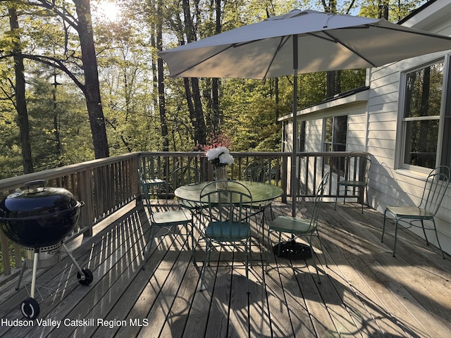 35 Jilroy Ln, Spencertown, NY 12165 - wooden deck with outdoor dining space