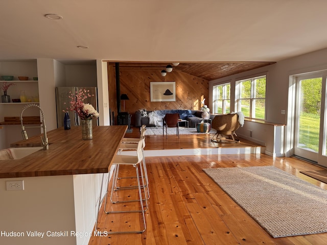 35 Jilroy Ln, Spencertown, NY 12165 - dining space with wood-type flooring and wood walls
