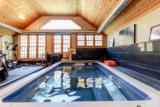 view of pool featuring a jacuzzi