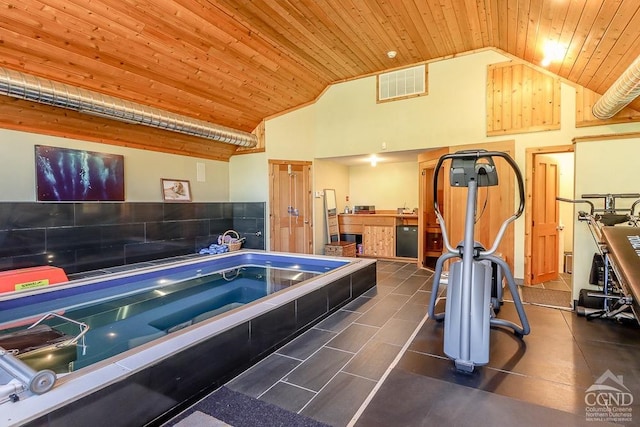 misc room with wooden ceiling and high vaulted ceiling