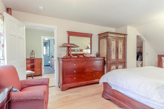 bedroom featuring light wood-style floors