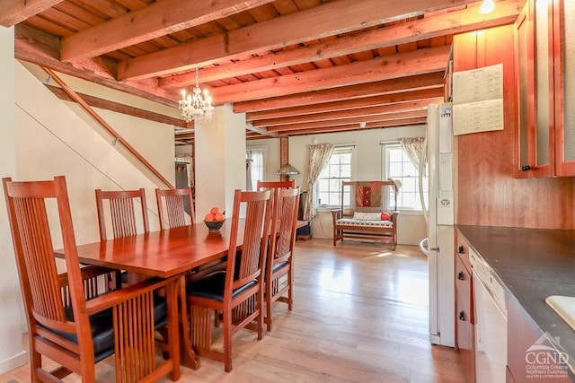 dining area with wood ceiling, beamed ceiling, light wood-style flooring, a chandelier, and stairway