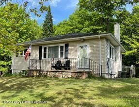 23 Red Barn Rd, Shawangunk, NY 12566 - view of front of property featuring a chimney and a front lawn
