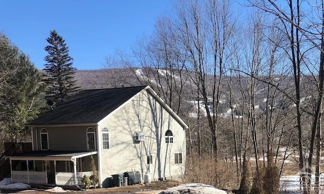 16 Hickory Hill Rd, Windham, NY 12496 - view of side of home featuring a porch