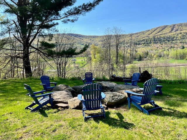 16 Hickory Hill Rd, Windham, NY 12496 - view of yard featuring a fire pit, a mountain view, and a wooded view