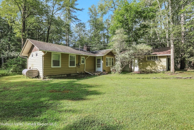 1055 Rte 212, Saugerties, NY 12477 - ranch-style home featuring a front lawn, a chimney, heating fuel, and roof with shingles
