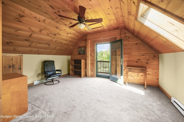 17 Partridge Rd, Hudson, NY 12534 - unfurnished room featuring a baseboard heating unit, wooden ceiling, carpet, vaulted ceiling, and wood walls