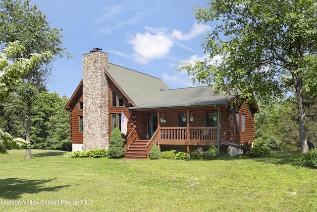 17 Partridge Rd, Hudson, NY 12534 - cabin featuring log siding, a porch, a chimney, and a front yard