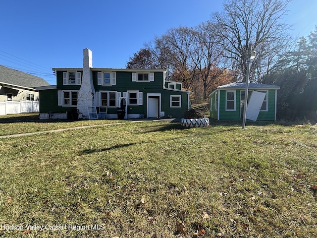 view of front of home with a front yard