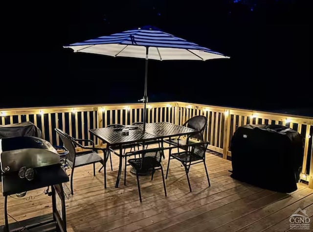 57 Bushnell Ave, Catskill, NY 12414 - deck at twilight featuring outdoor dining area