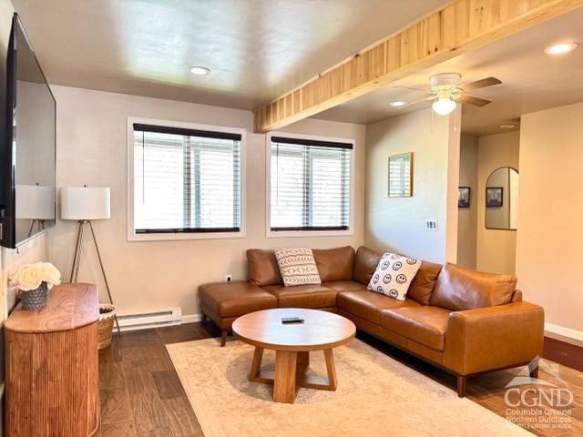 57 Bushnell Ave, Catskill, NY 12414 - living area featuring a baseboard radiator, baseboards, plenty of natural light, and recessed lighting