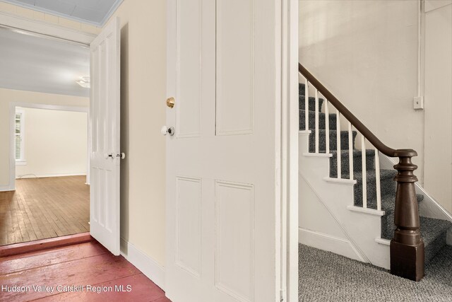 1 Green St, Gilbertsville, NY 13776 - stairway with baseboards and hardwood / wood-style floors