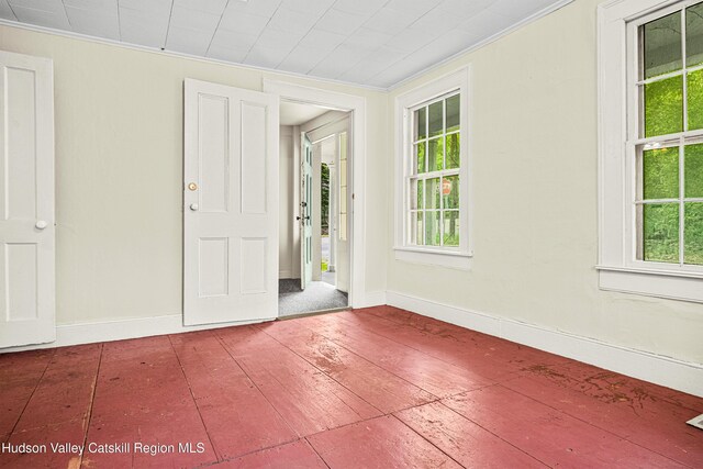 1 Green St, Gilbertsville, NY 13776 - spare room with hardwood / wood-style flooring, crown molding, and baseboards