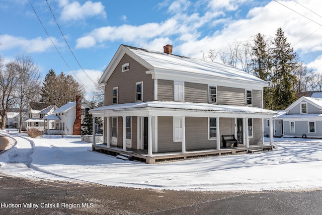 1 Green St, Gilbertsville, NY 13776 - view of front of home with a chimney and a porch