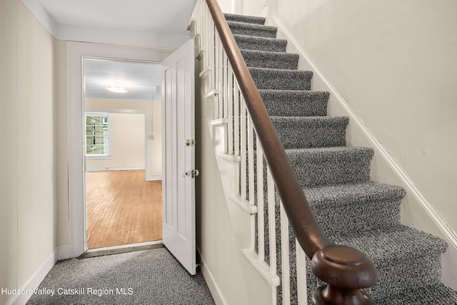 1 Green St, Gilbertsville, NY 13776 - stairs featuring baseboards