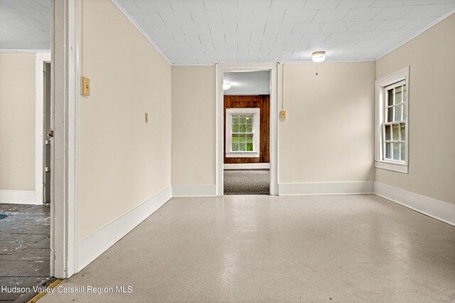 1 Green St, Gilbertsville, NY 13776 - unfurnished room with crown molding and baseboards