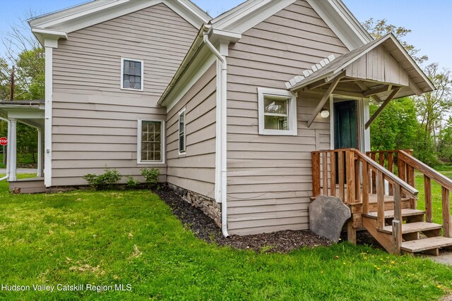 1 Green St, Gilbertsville, NY 13776 - rear view of house with a yard