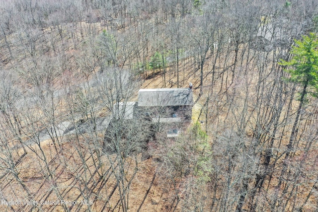 aerial view featuring a view of trees